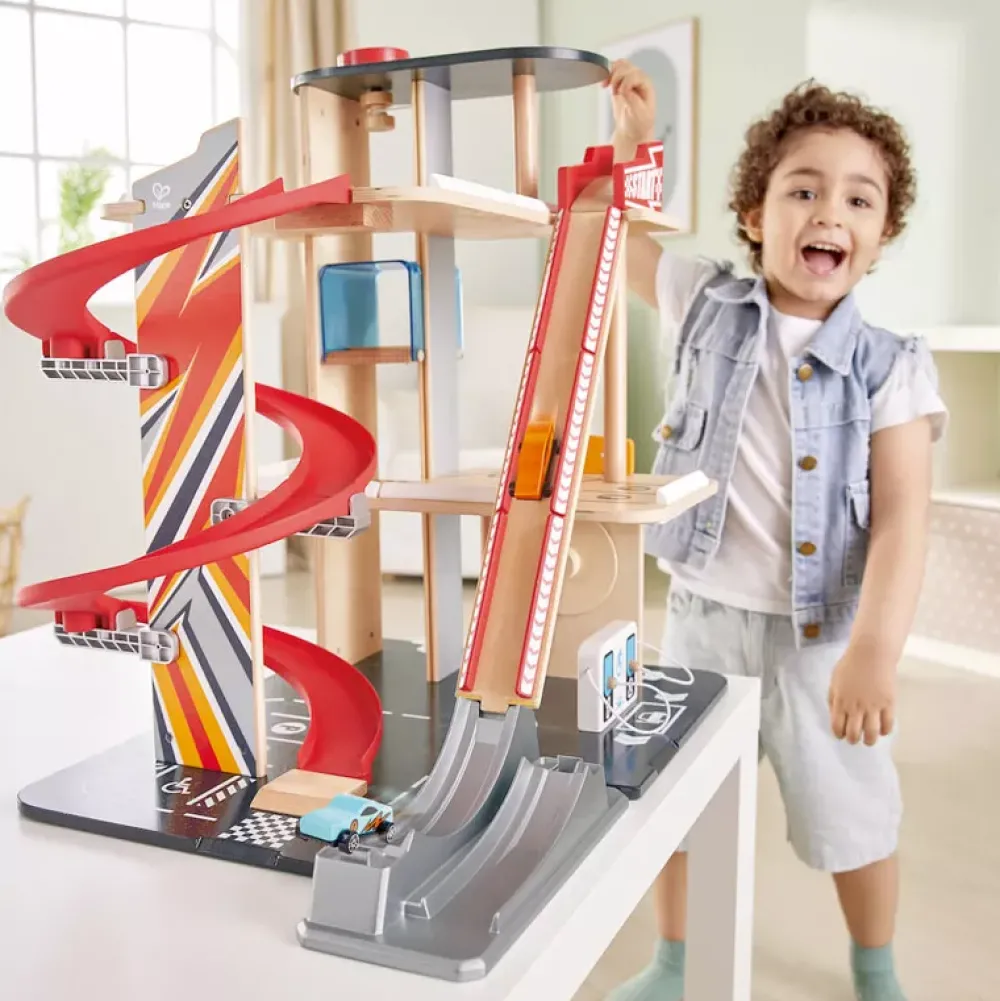 Hape Garaje Con Saltos Y Piruetas Store